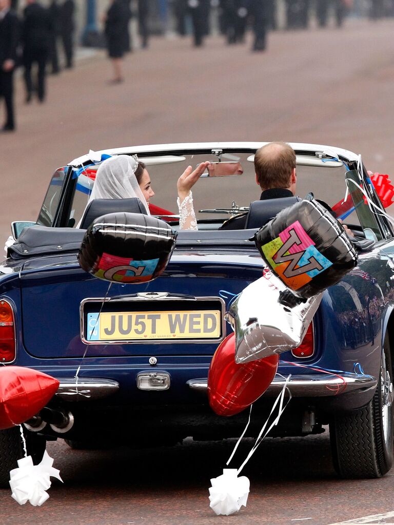 William and Kate in their getaway car. 