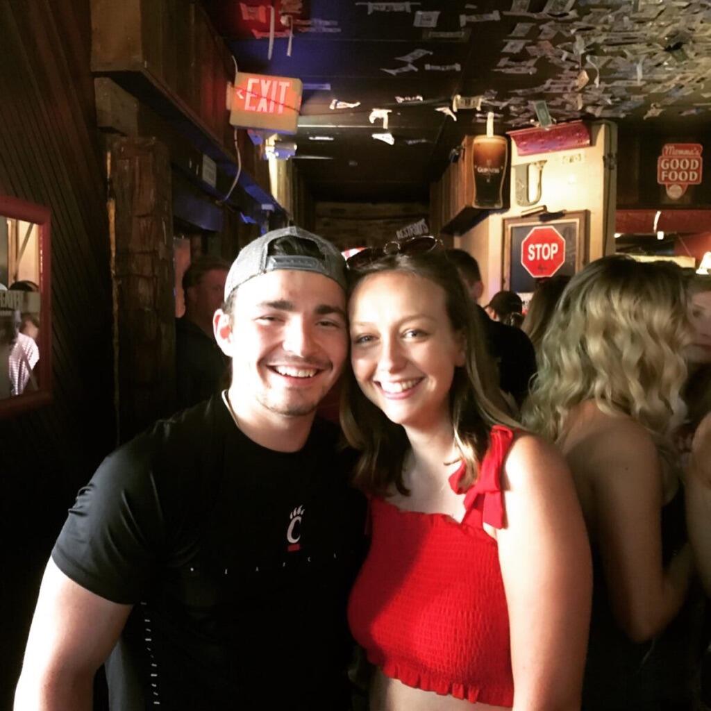Hal and Megan cheering on the University of Cincinnati at their favorite bar, Uncle Woody's!