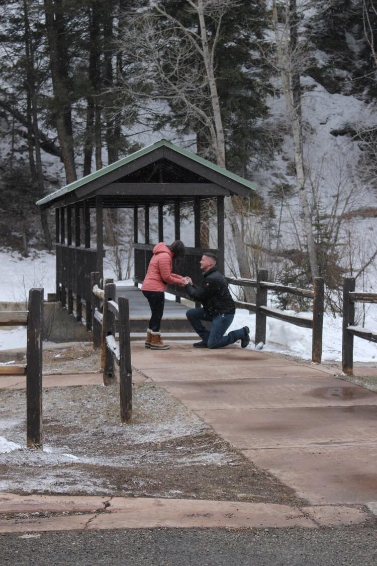 Caleb got down on one knee...