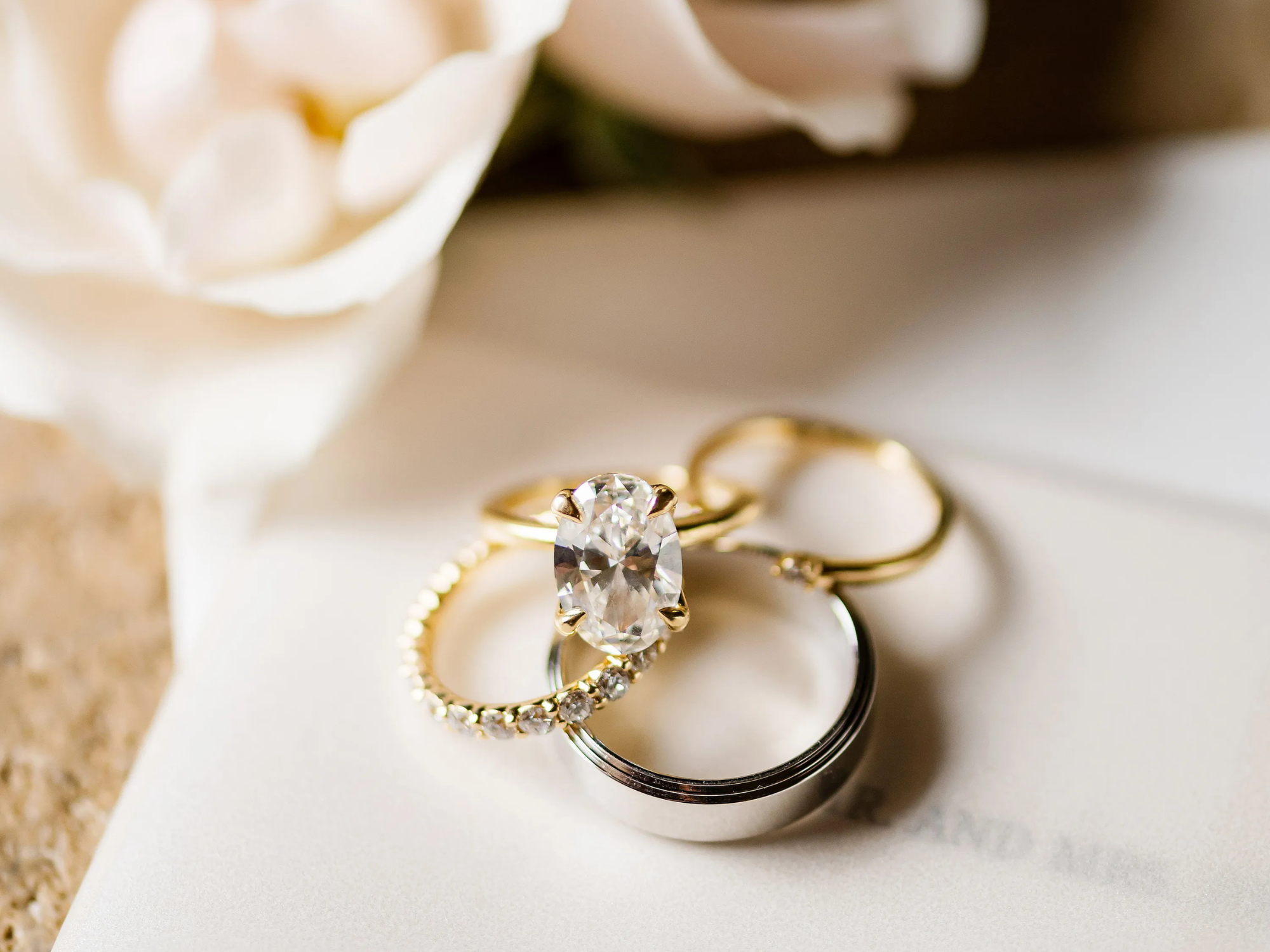 Stack of diamond engagement and wedding rings