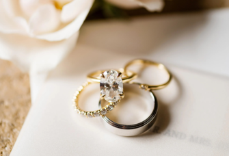 Stack of diamond engagement and wedding rings