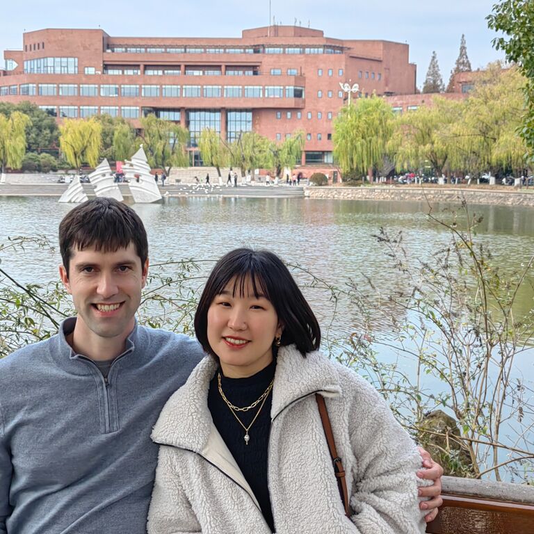 Tim visited Dian’s family in Shanghai during the winter of 2023, and Dian’s mom captured this picture of them at Dian’s alma mater!