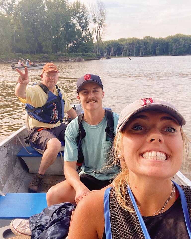 This is a silly moment because I (Kate) specifically remember it being the first time I was with Colin and not with another teammate. (The man in the back is the chaplain at University of Iowa) We were taking a boat ride on the Mississippi and for about 10 minutes we had the most choppy, awkward conversation possible. I remember thinking that there was noooo way Colin could like me after that, looks like I was wrong lol !