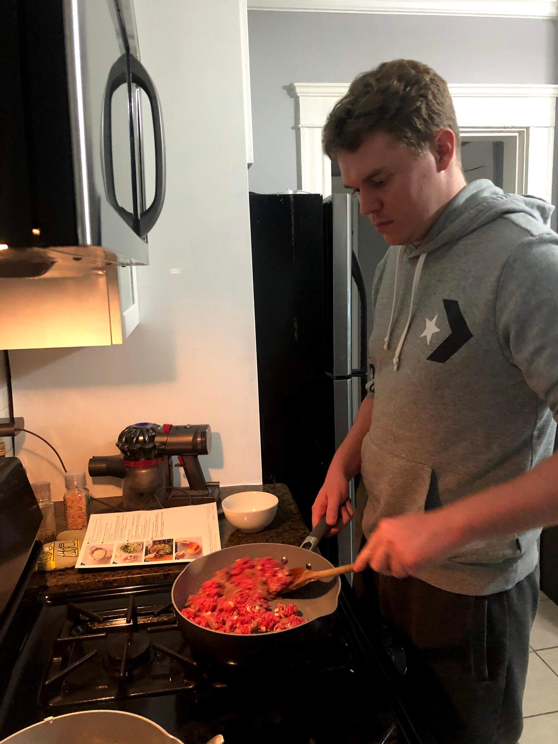 Tim's first (and only) time cooking in our new home 
