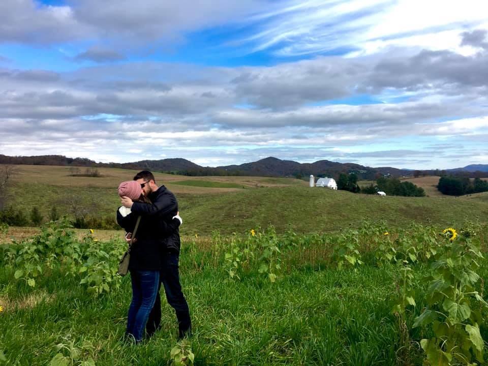 She Said Yes! - Alex proposed at a pumpkin patch on Audrey's favorite day of the year, Halloween! He brought her to the sunflower field and told her he had a prop for a picture, got down on one knee, and asked her to marry him. Of course she said yes!