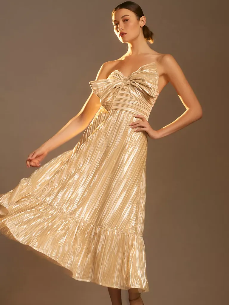 Gold strapless holiday party midi dress with bow