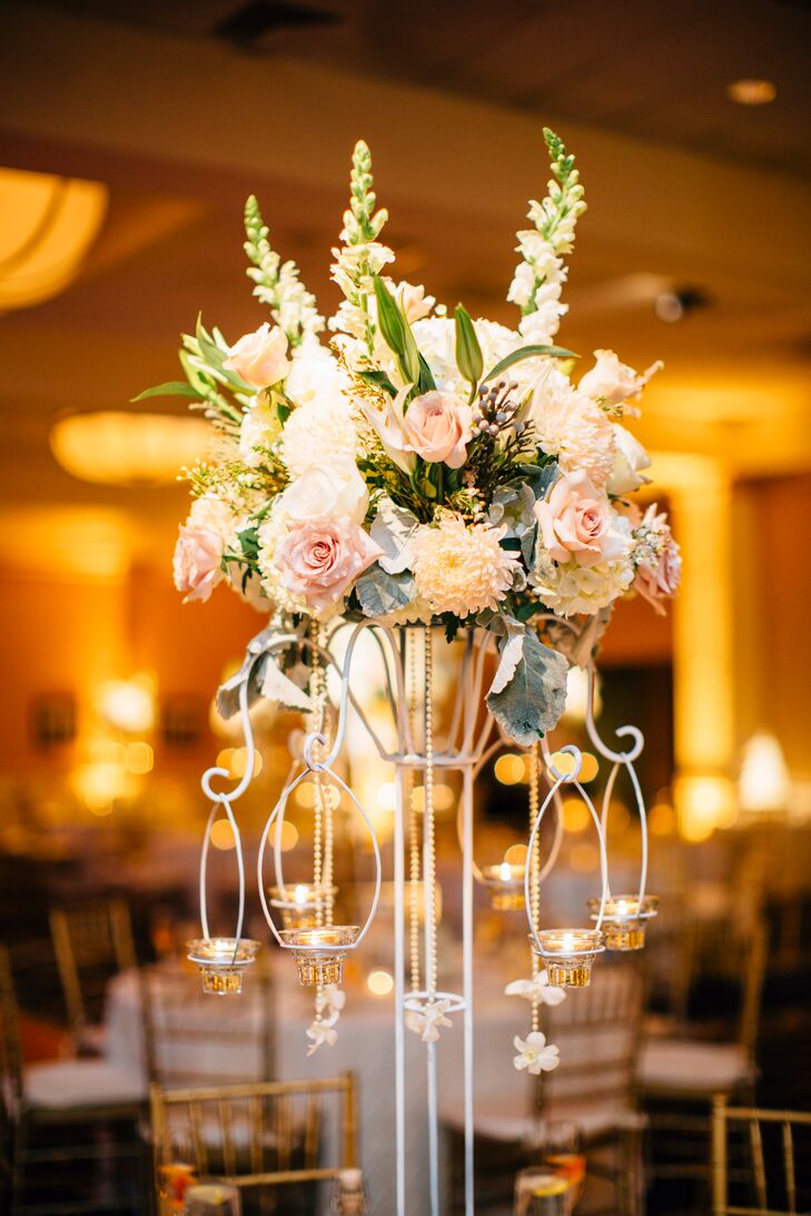 Blush And White Centerpiece With Cascading Candles