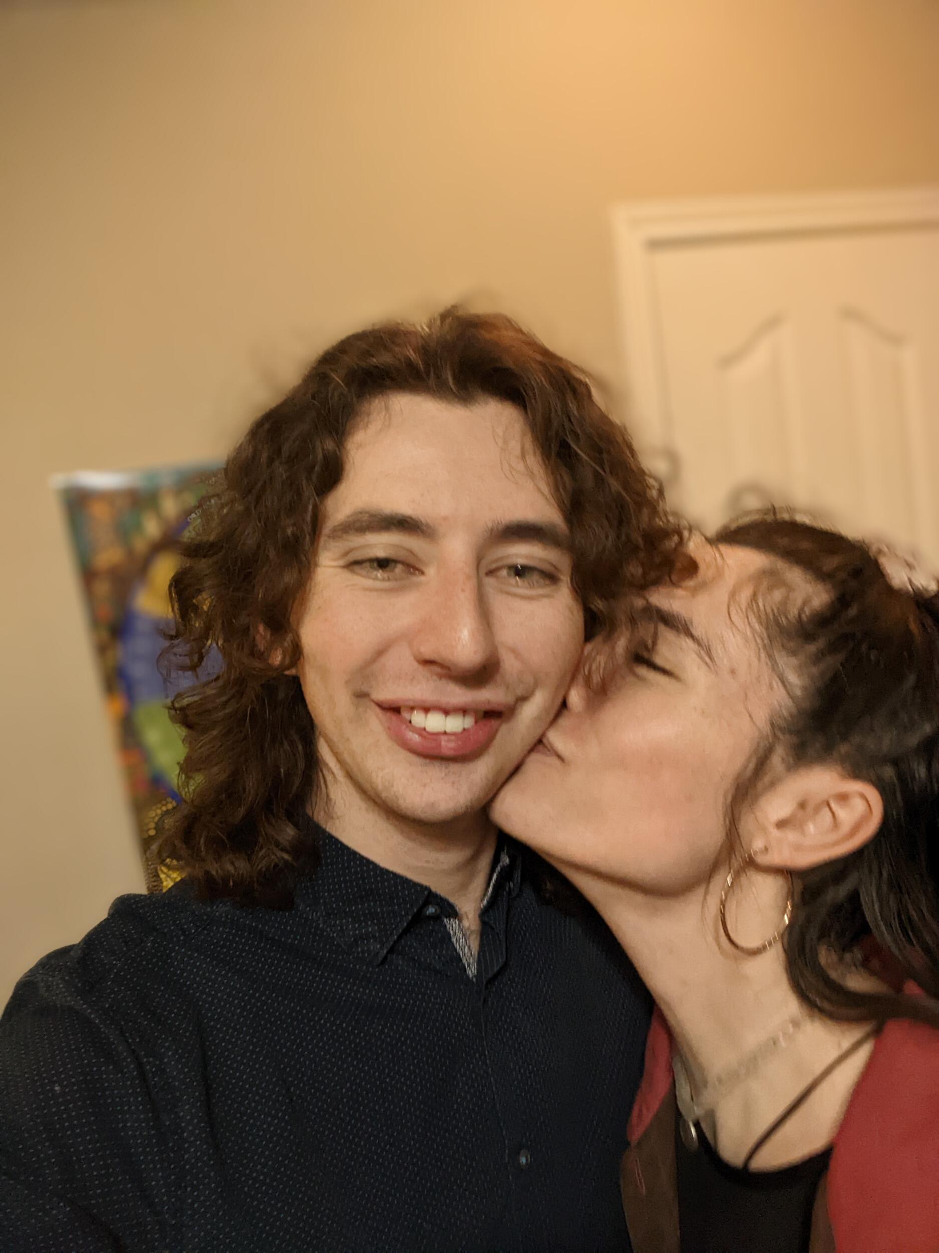 We celebrate our one-year anniversary by going out to eat at Rise. Ben has beautiful luscious curly locks at this point - but not for much longer