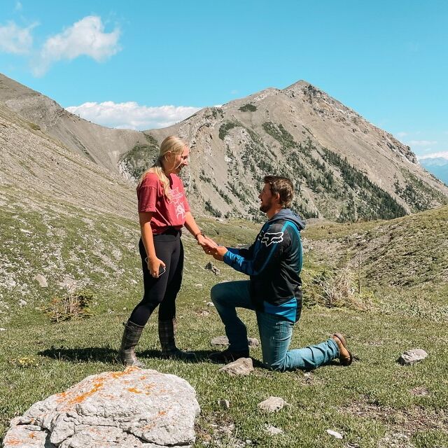 Justin proposed on the top of a mountain and I said yes! Thank goodness his dad hiked up to this spot with us to capture it (but also being surprised).