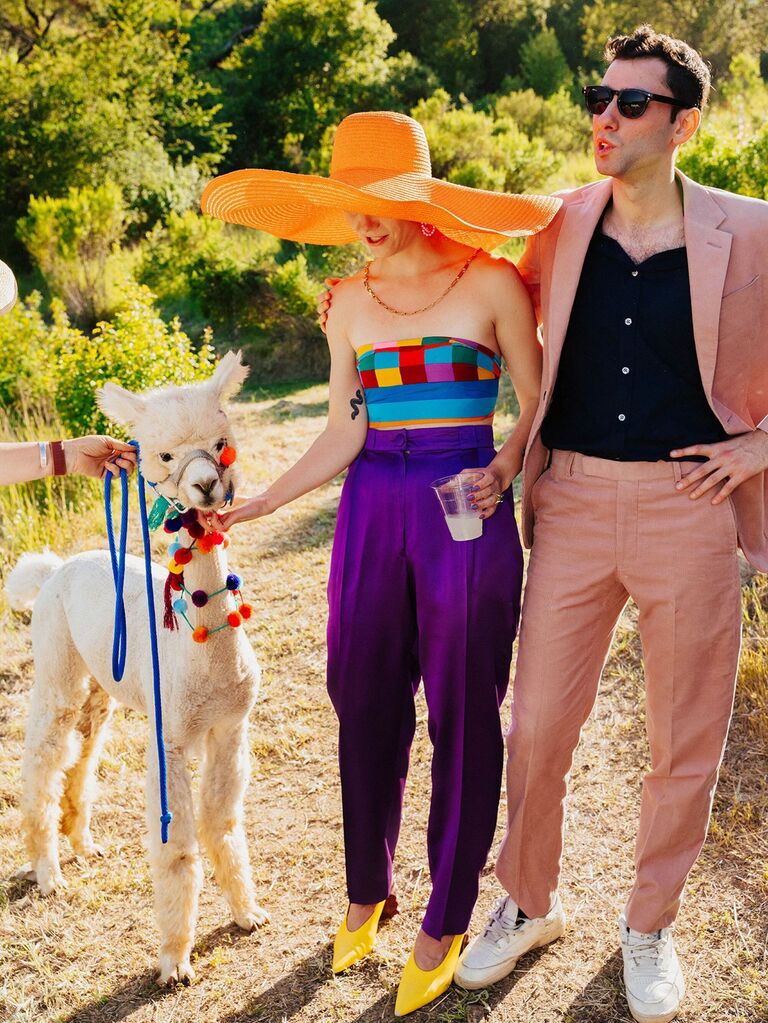 Couple wearing colorful attire summer engagement photo idea