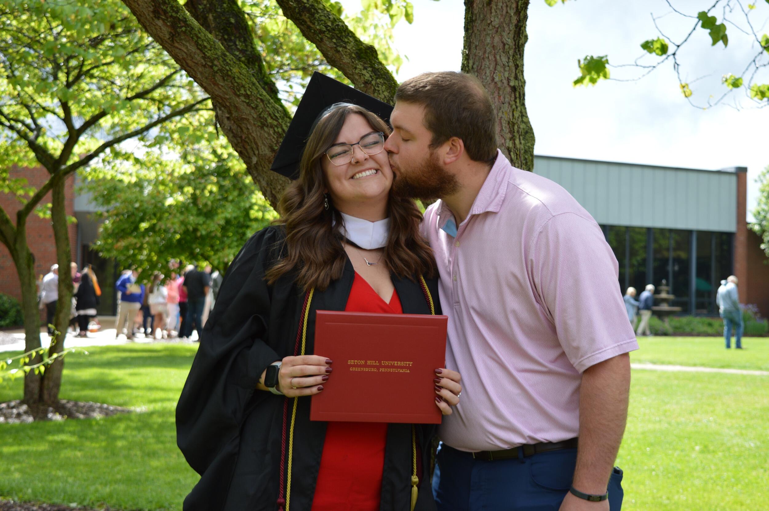 The day Alaina graduated with her Master's in Art Therapy with a Specialization in Counseling!