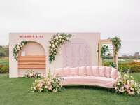 pink floral seating chart with velvet sofa 
