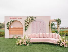 pink floral seating chart with velvet sofa 