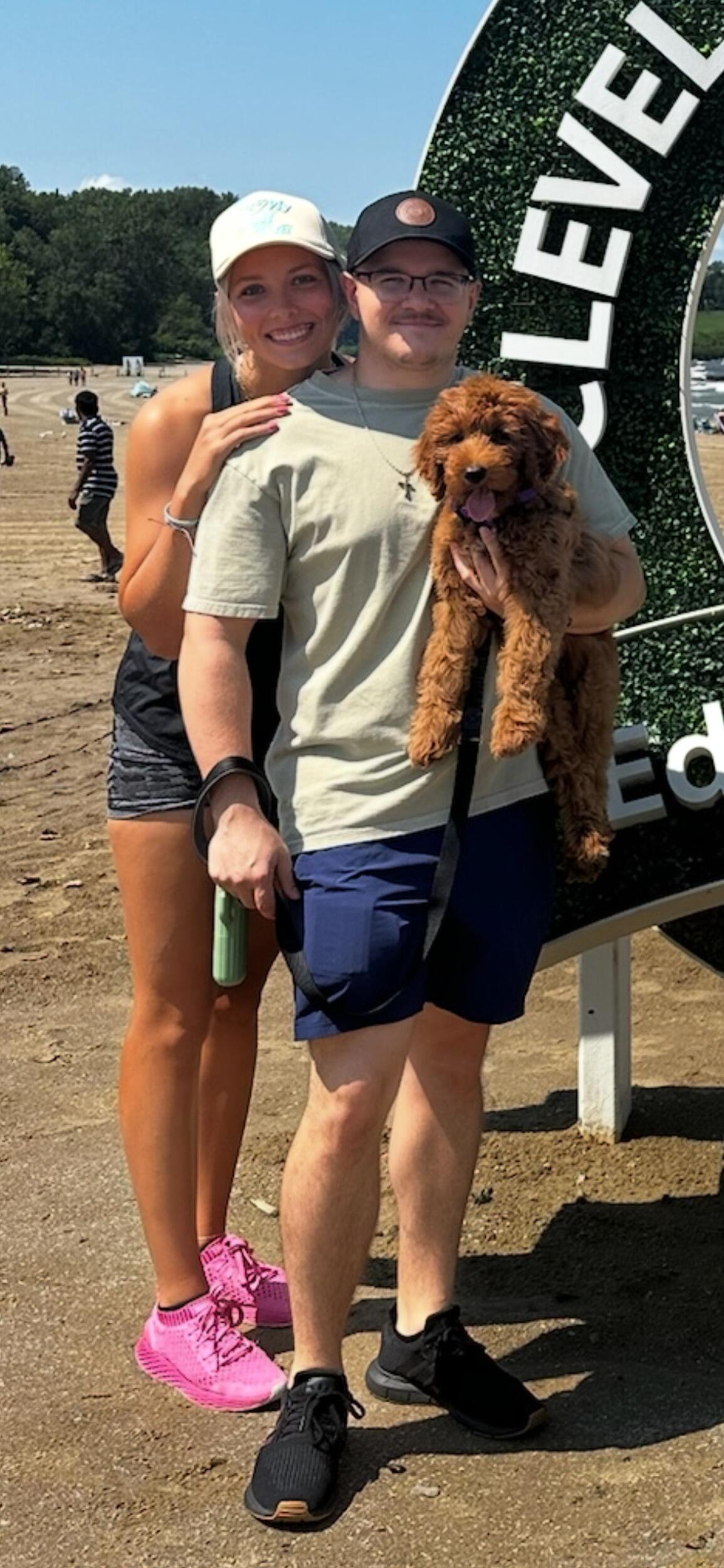 Nate and Haley decided to add a furry little Goldendoodle to their home! They picked Sadie Belle up from a breeder in Ohio and their lives haven't been the same since! She isn't very "little" anymore and has definitely been such a joy ever since they got her! She is the happiest girl who loves toys, sticks, and everyone she meets.