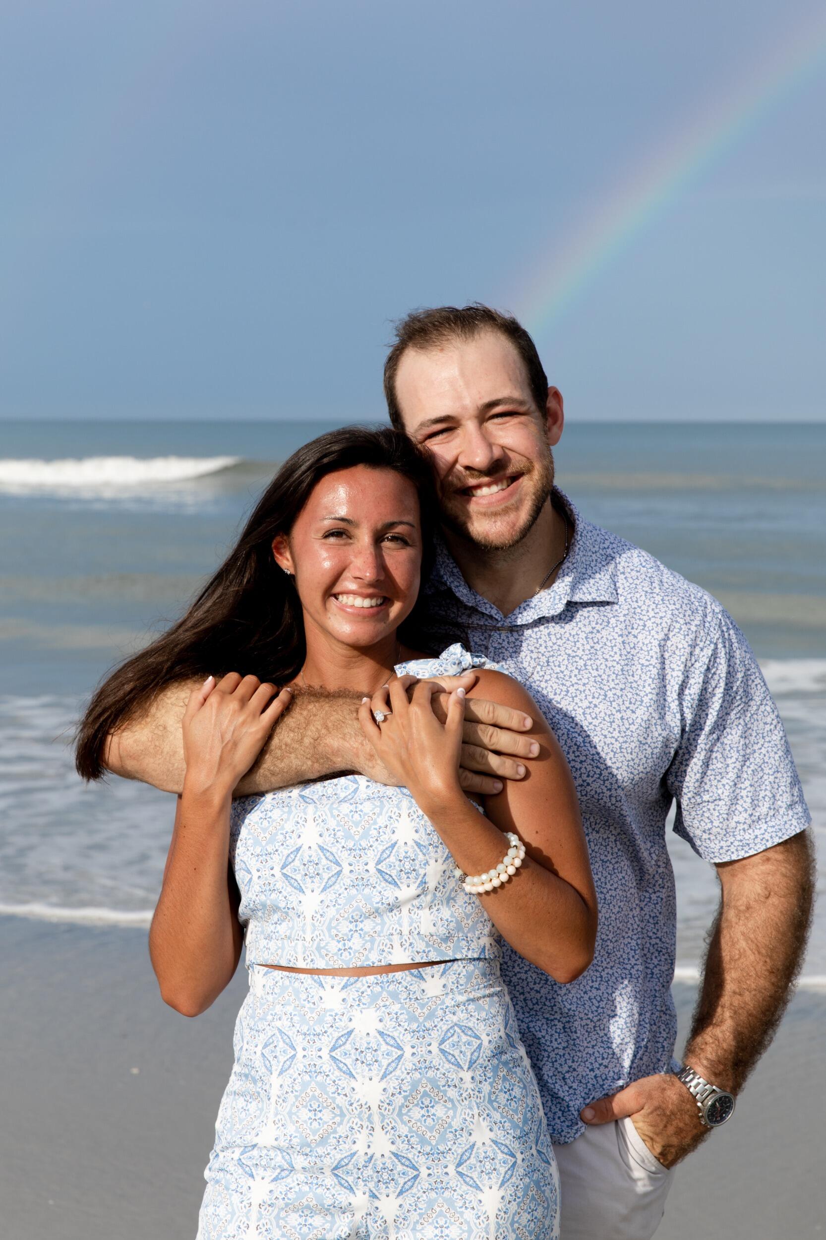 June 28, 2025
On a beach at sunset, with a perfect rainbow overhead (we know, it sounds fake—but it’s not), Thomas got down on one knee. Elizabeth said yes! Cue the happy tears, hugs, and a surprise celebration with friends who were all in on it.

And Now...
We're getting married! We’re so excited for this next chapter in life and can’t wait to celebrate with each and every one of you. Your love and support mean the world to us, and we feel so lucky to share this joyful season together