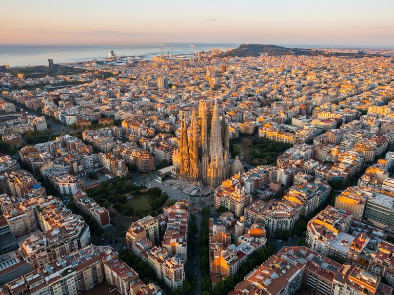 Barcelona City Skyline with Sagrada Familia Cathedral at sunrise. Catalonia, Spain. Aerial view 