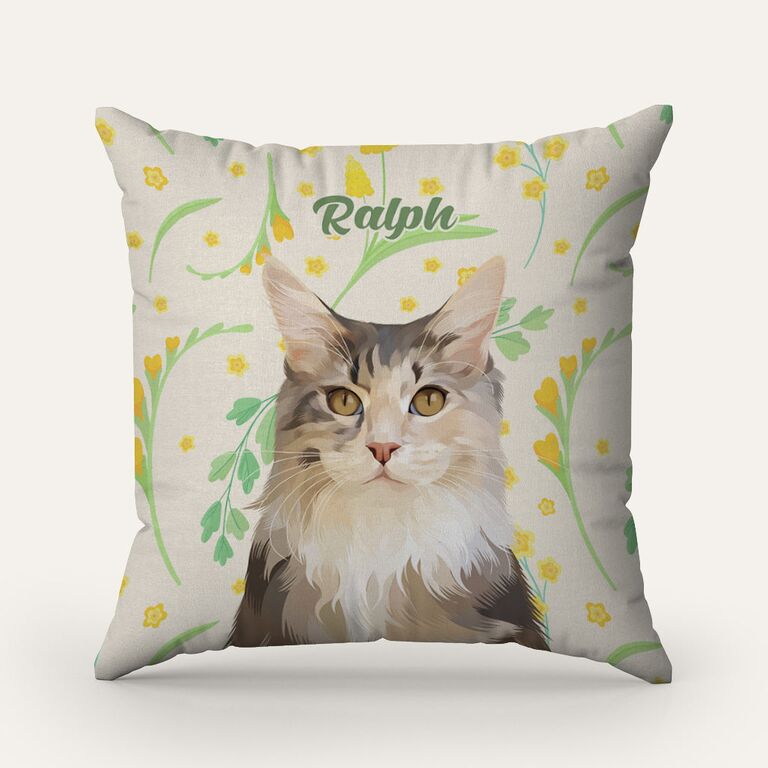 Custom cushion depicting the face and name of a beloved pet. 