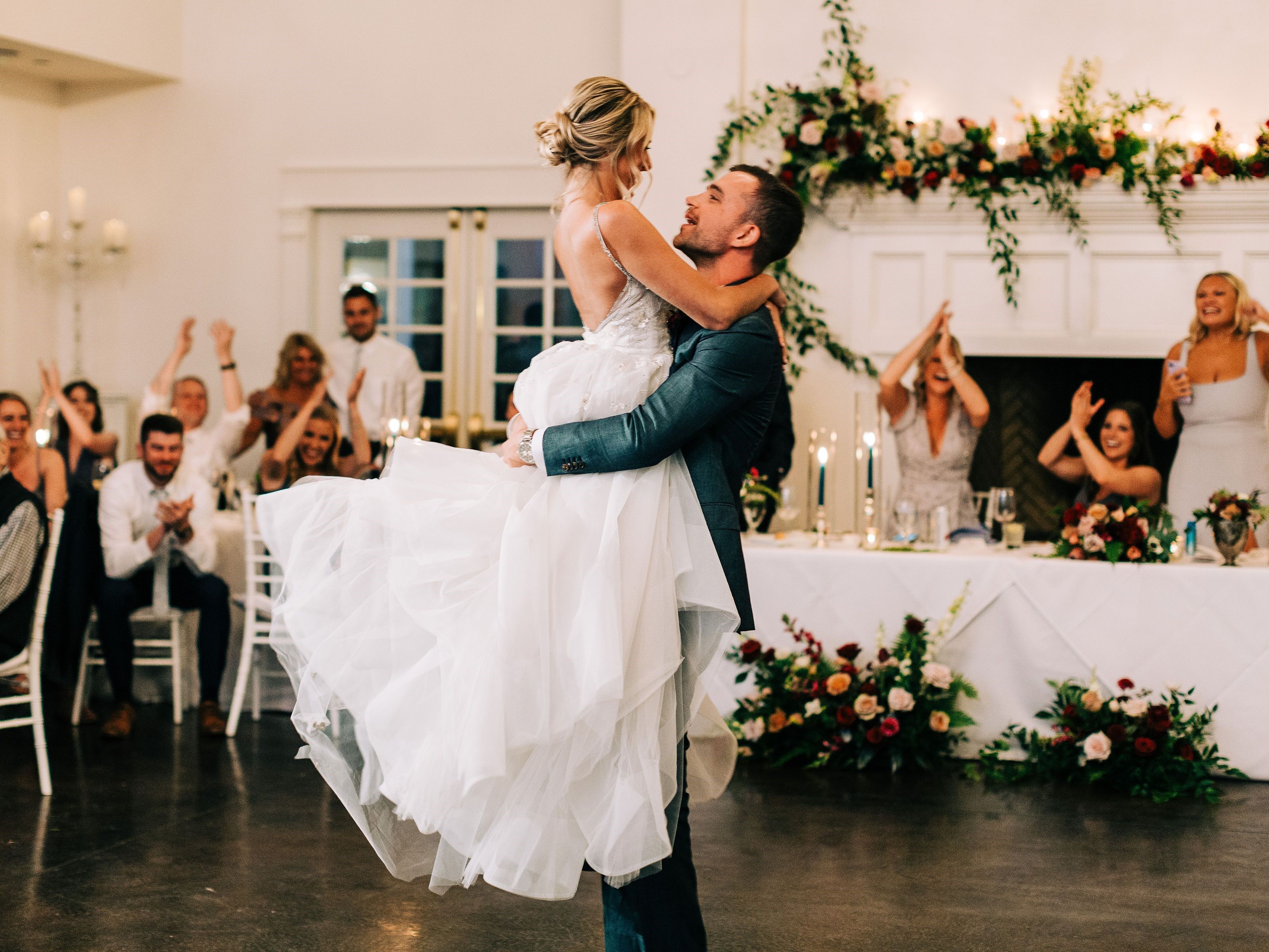 Couple having fun dancing at their reception