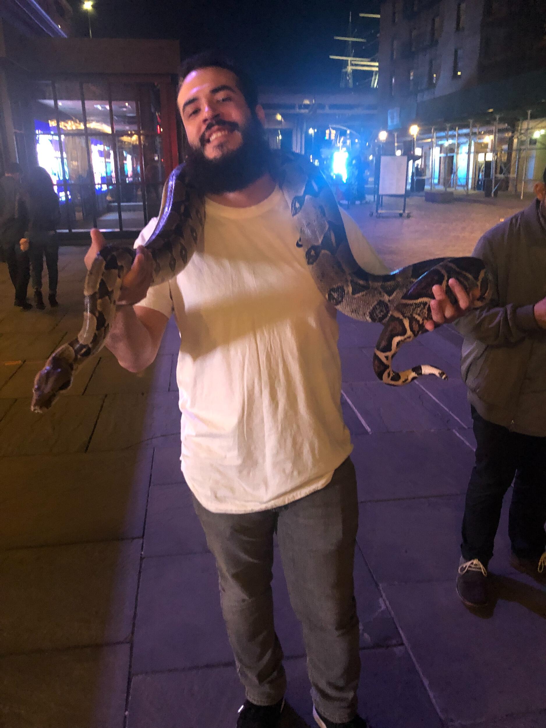 Seaport nights. It was Matt's first holding a snake; he was not a fan. 