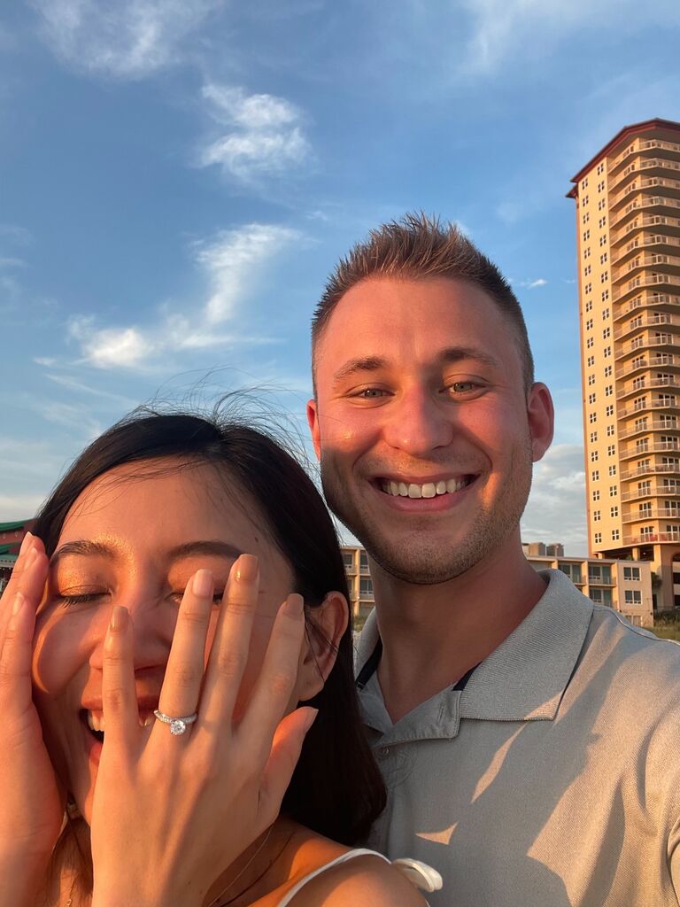 However, after 3 months of long-distance,  Nick proposed on a sunny, summer night in Destin, FL solidifying our commitment to our future. 