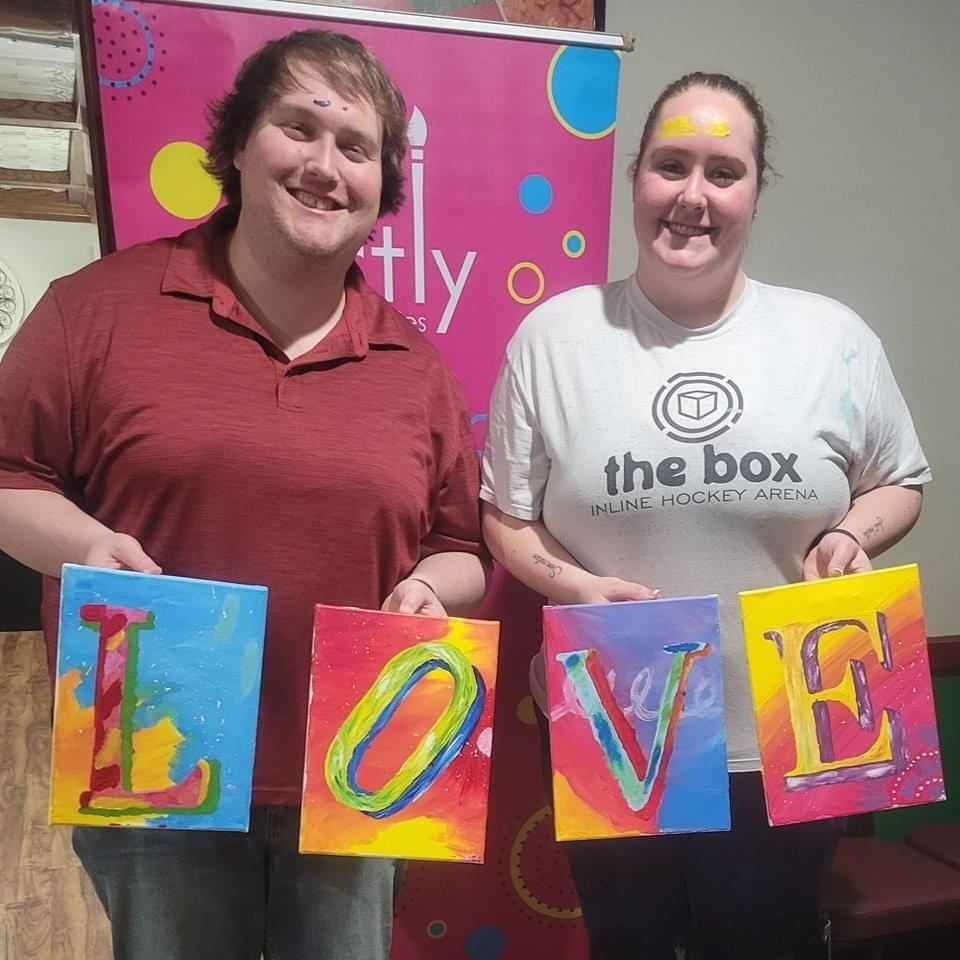 Sarah & Brett took a paint class where they each painted 2 letters of the word "LOVE" and had such a wonderful time!