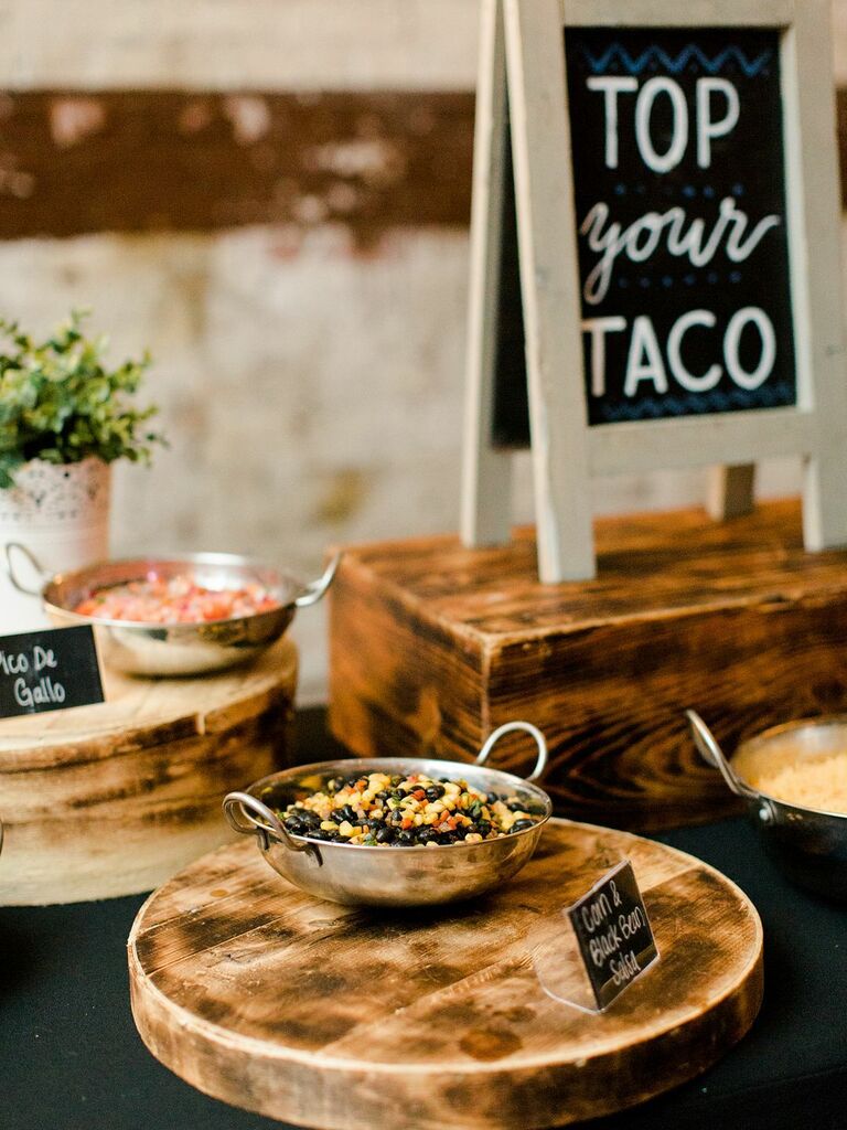 Taco topping bar featuring pico de gallo and a corn and black bean salad. 