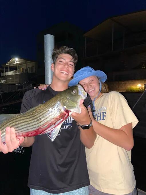 Bullhead City, AZ. On the Colorado River, Kaitlyn has the record for largest Striped Bass caught off the dock. We named her "Rhonda."