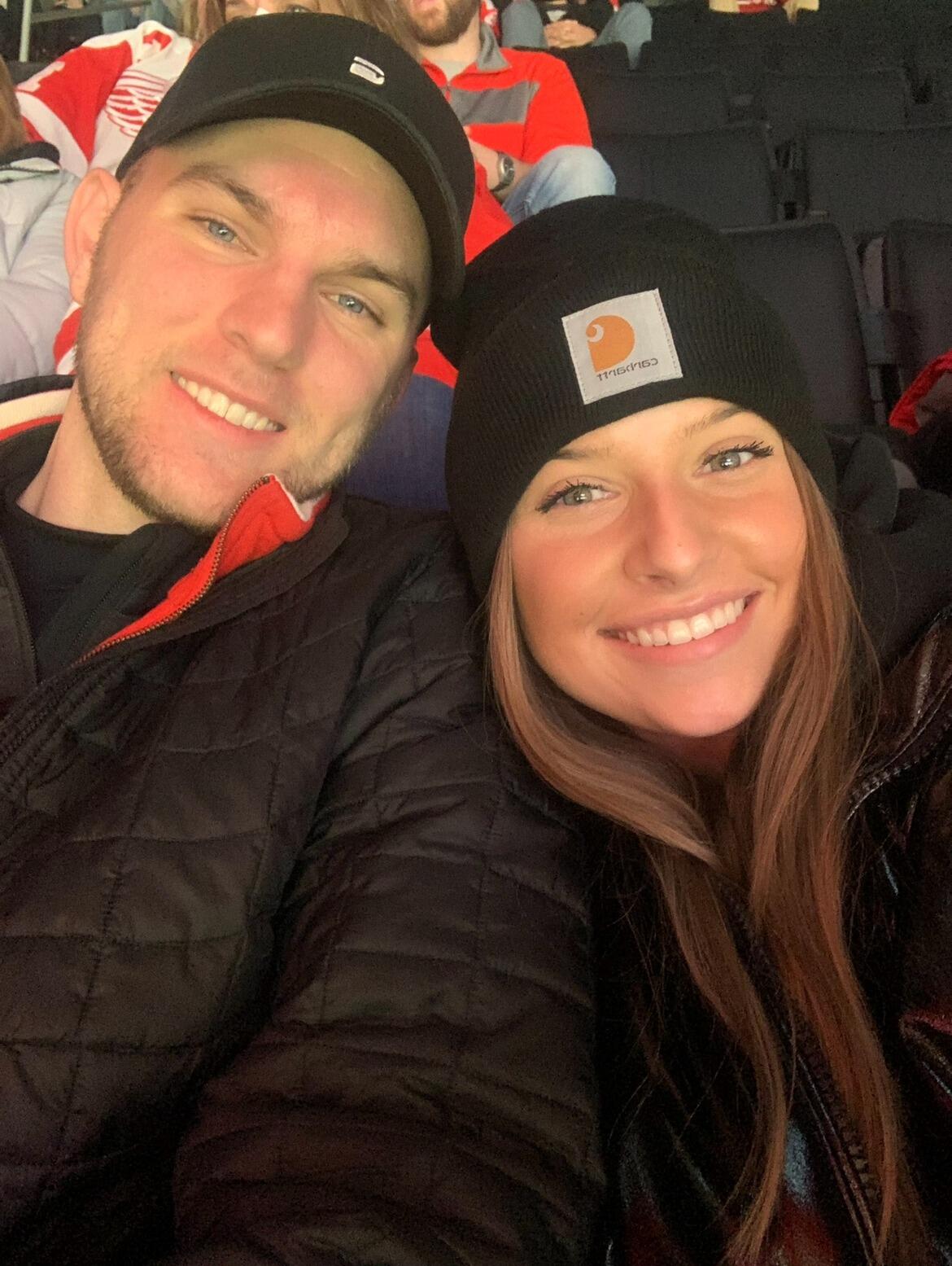 Alex and Madison at a Detroit Red Wings Game. Their shared love of sports is one of their favorite parts of their relationship
