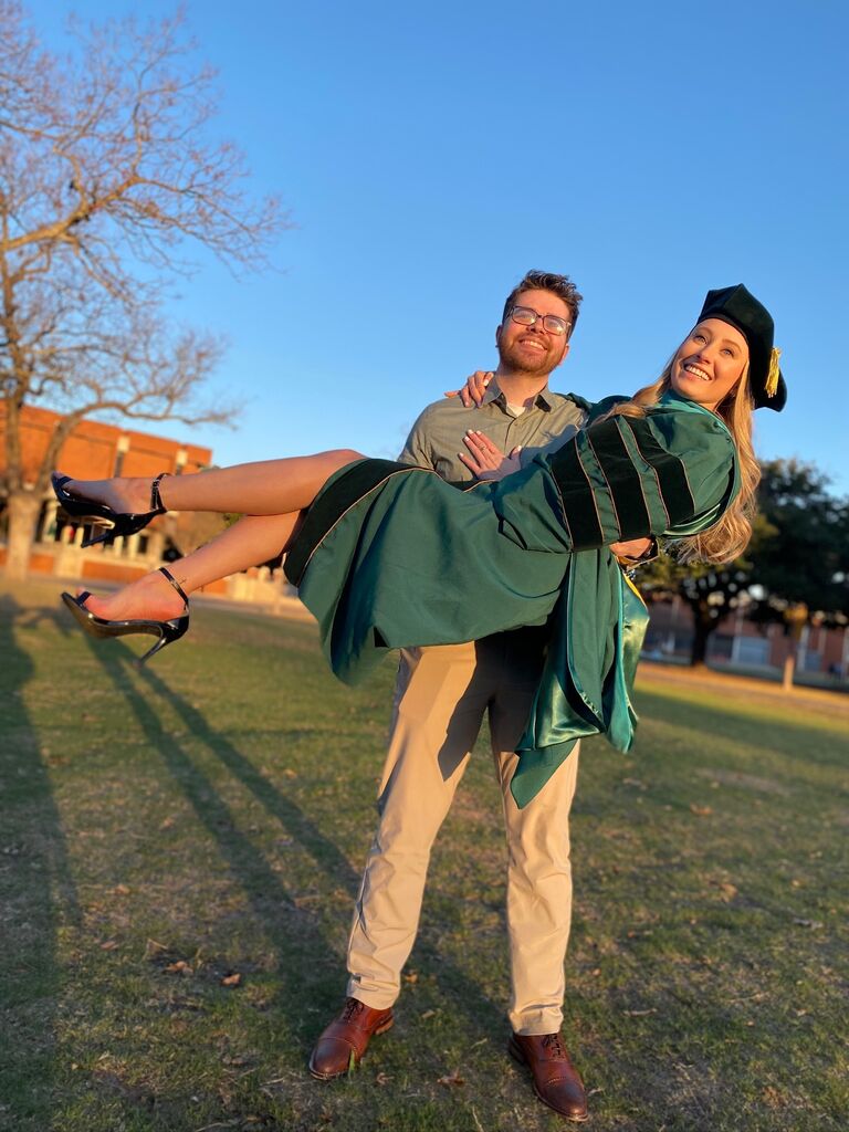 He supported her as she graduated