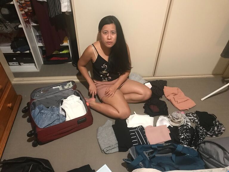 Mae packing (or panicking) for our first anniversary trip