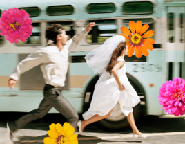 Couple running surrounded by flowers