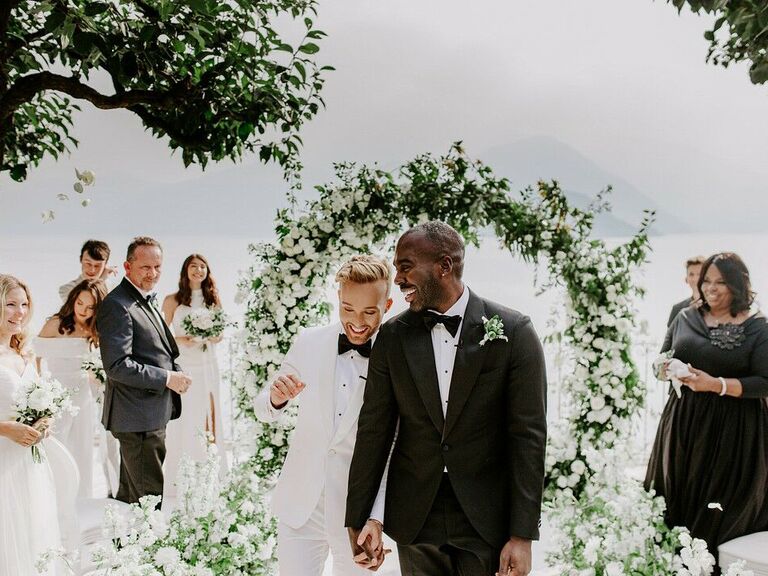 Couple walking down aisle in Italy