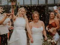 Two women celebrating at their LGBTQI+ wedding in the North East of England.