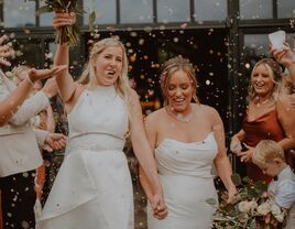 Two women celebrating at their LGBTQI+ wedding in the North East of England.