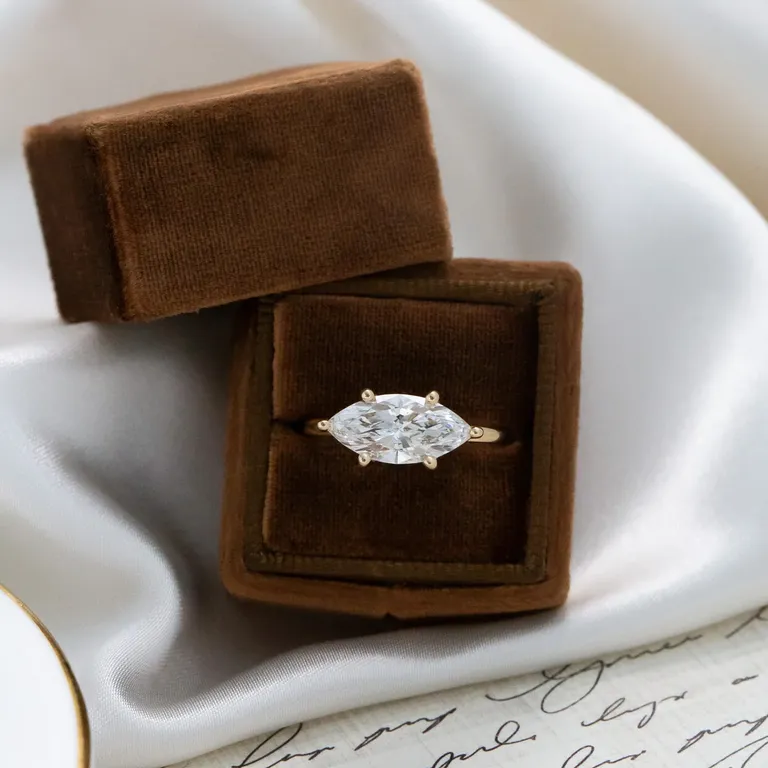 Marquise east-west solitaire engagement ring from Sarah O.