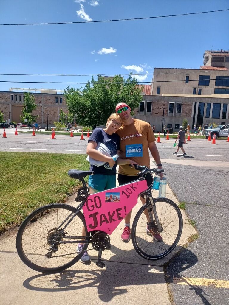 Cheering Jake on to run at the Boulder Boulder 10k. Go Jake!