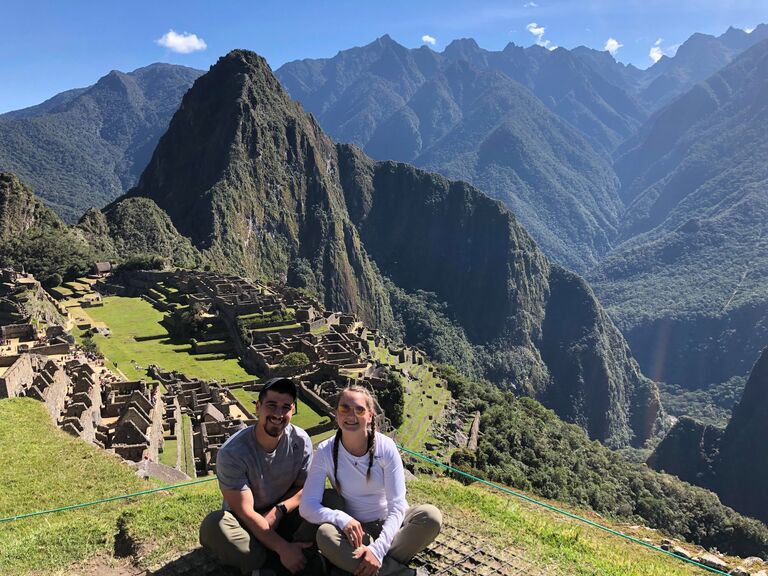 Before starting their full time jobs, Madi and Raz had the opportunity to go on a volunteer trip to the beautiful country of Peru. During their time there, they helped with rainforest preservation projects in the Amazon, built out infrastructure in remote mountain villages, and tried guinea pig for the first time! They also got to experience Machu Picchu, one of the Seven Wonders of the World, together. 