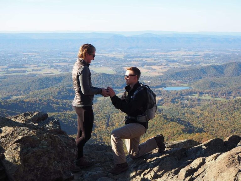 Sam proposed on October 21, 2022 while doing one of our favorite things --  hiking in the Virginia mountains! He chose the perfect spot on top of Little Stony Man in Shenandoah National Park (one of the first hikes we ever did together back in summer of 2015). 