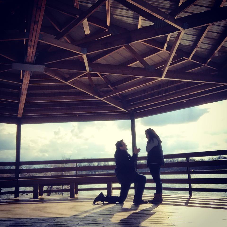 On March 31, Justin said we were going on a secret errand. We went to Barr Lake and walked around looking for eagles and enjoying the scenery. We walked out to a gazebo in the middle of the water. While Lainey was looking through the binoculars, Justin got down on one knee and when Lainey turned around, he proposed. It was an incredibly special moment shared just with the two of us.
