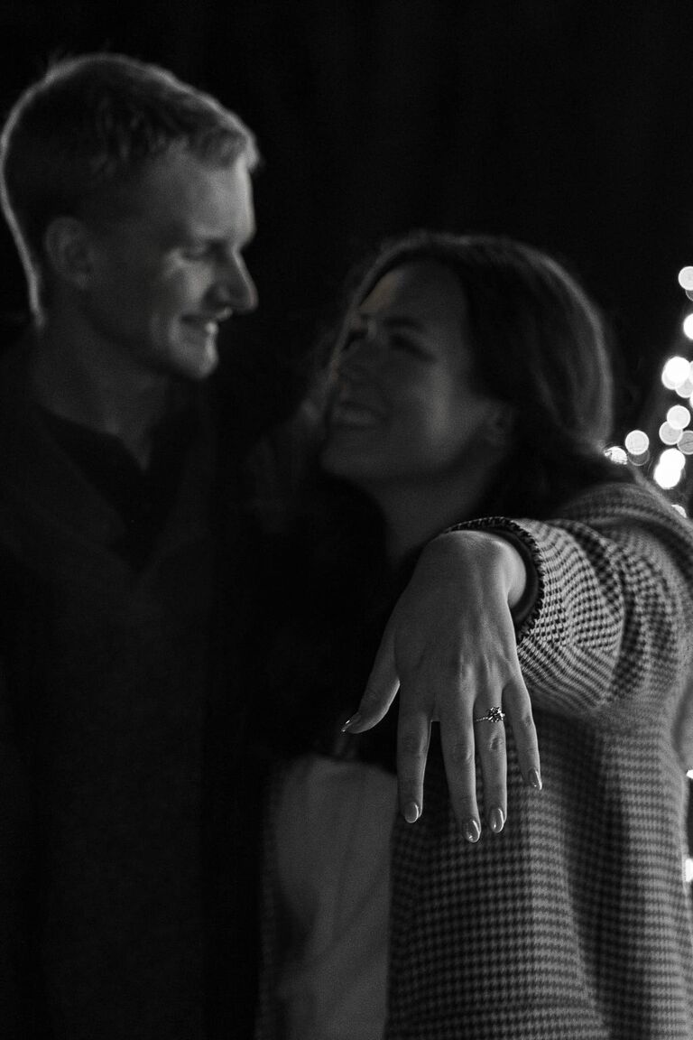 Abbie's favorite day, Christmas Eve, became even more magical! Remembering her beloved childhood tradition of looking at Christmas lights, Joe chose the "Miracle on 86th St." to propose. With Abbie's whole family there and a photographer ready, it was perfect. 