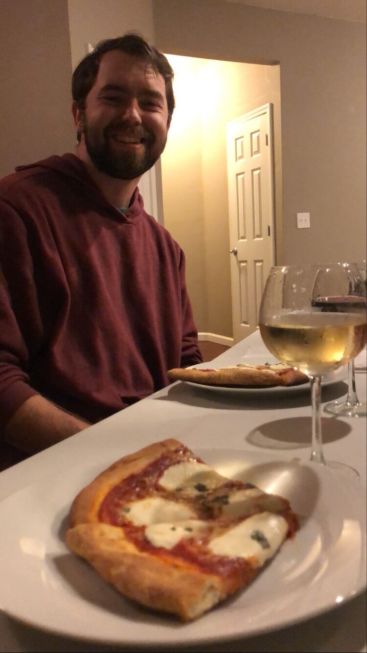 We moved into together! On the first night that we both spent in the condo, we made pizza from scratch. 