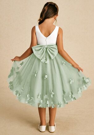 Sprout combines an enchanting A-line shape with a blend of tulle and matte satin. Its sweet scoop neckline and elegant V-back are complemented by a charming zipper closure and adorable bows, creating a delightful look for any little girl on a special occasion. This dress is not only perfect for a flower girl at a wedding but also versatile enough for other special occasions.