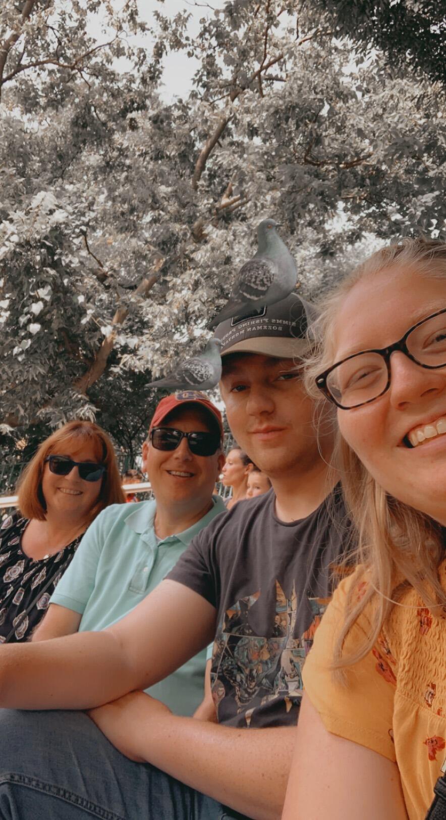 Showing Beth's parents the Cincinnati Zoo and playing with snapchat filters while we wait for the cheetah show
