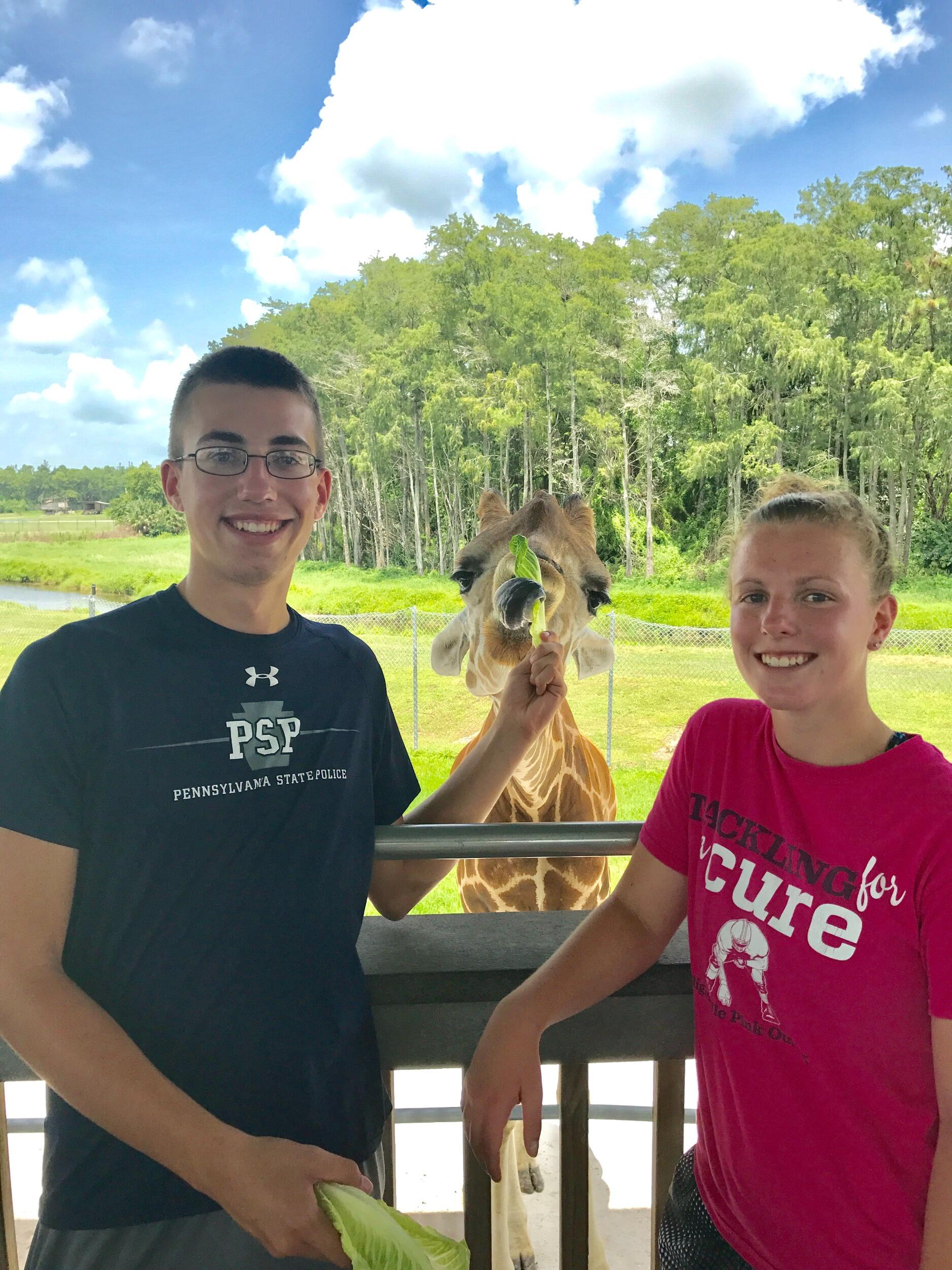 Feeding Mandy's favorite animal on a Gilbert family trip to Florida