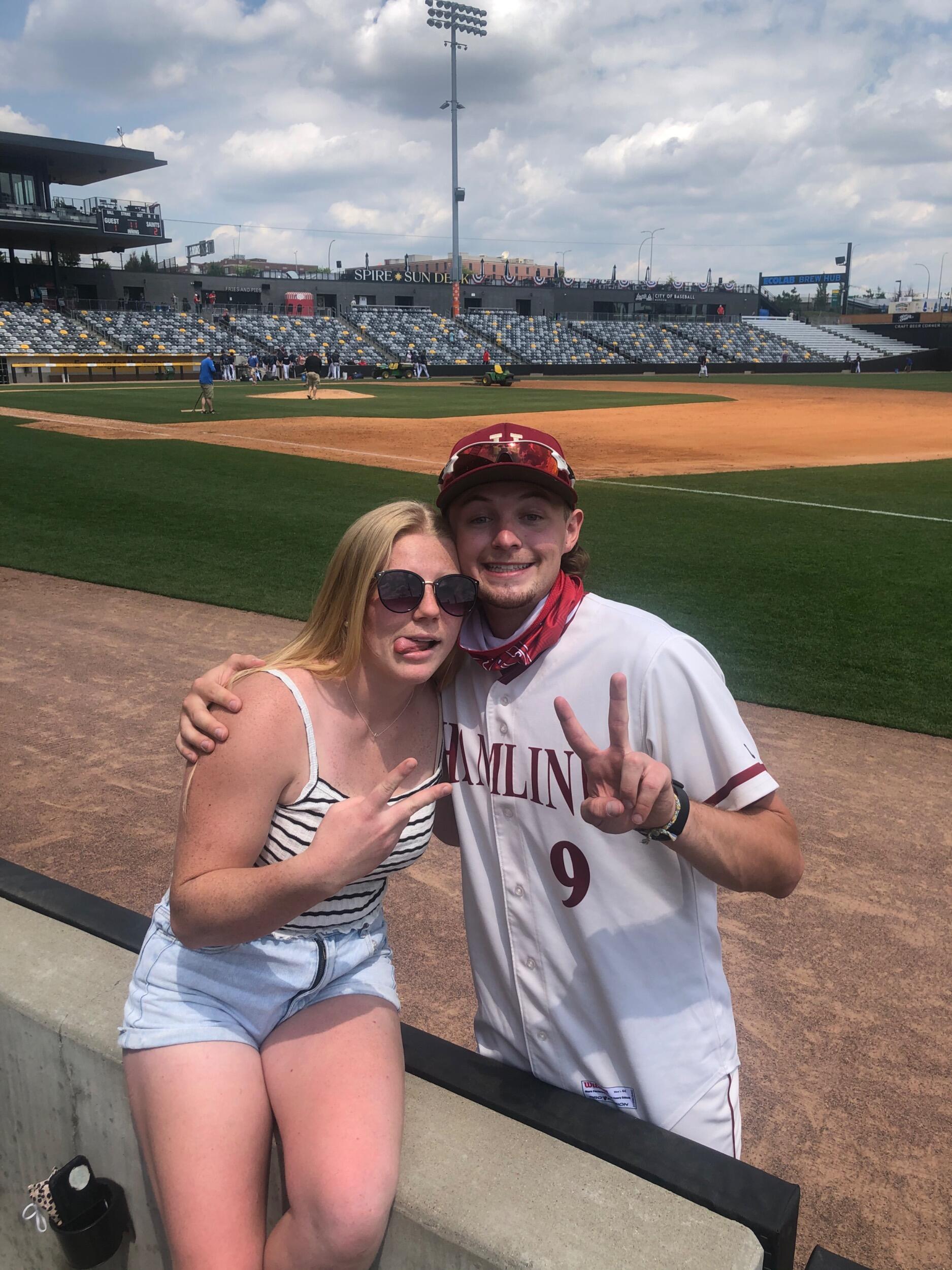 Brooke supports Teague in his role as an assistant coach for the Hamline University Baseball team.