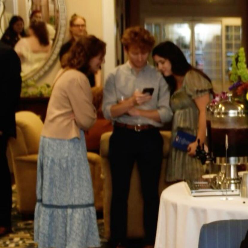 Where it all began...
Clara, Sarah, and Lucas were attending a wedding together and decided to brainstorm potential suitors for Clara (Lucas was determined to get Clara "wifed up"). They eventually texted Lucas and Sarah's friendly new upstairs neighbor, Kyle Preston. Fortunately, the moment when they crafted the text was caught on camera!