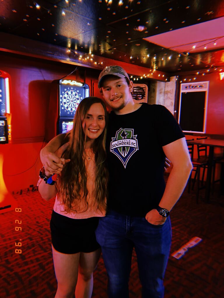 Taken during Joseph's college move-in weekend at our most frequented college bar...The Star Bar. 30 minutes later, Brandon asked Abi's dad for her hand in marriage over a tray of fireball shots.
