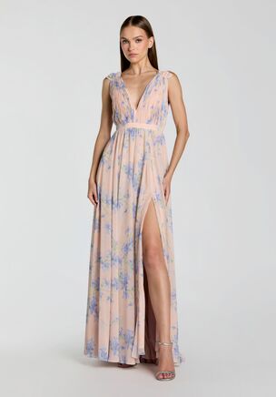 Ruched chiffon maxi dress with a plunging v-neckline and thigh high slit.