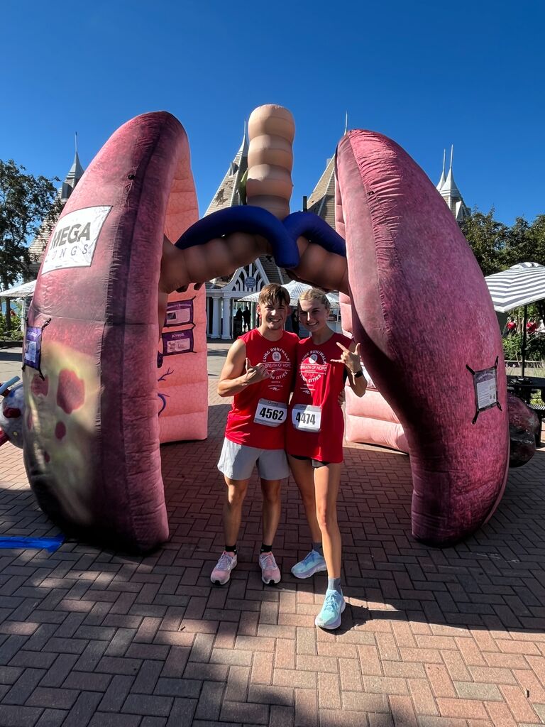 Sam convinced Elias to run a 10k with her the night before race day... and she beat him