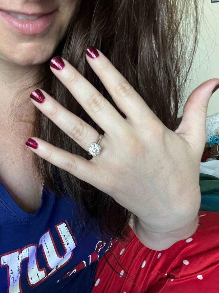 When I was having a mini meltdown one day - I asked to see the ring since I knew he had it, (after BEGGING for DAYS) and he finally let me see it. AND IT WAS GORGEOUS - but I told him "I cannot wear this! It's massive, you have to return it". Long story short, He couldn't return it, so we settled for getting a second ring that I could wear every day and this one I could wear for special occasions. 